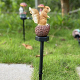 Squirrel stepping pine nut solar garden light