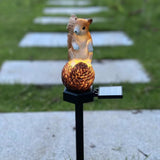 Squirrel stepping pine nut solar garden light