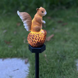 Squirrel stepping pine nut solar garden light