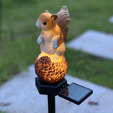 Squirrel stepping pine nut solar garden light